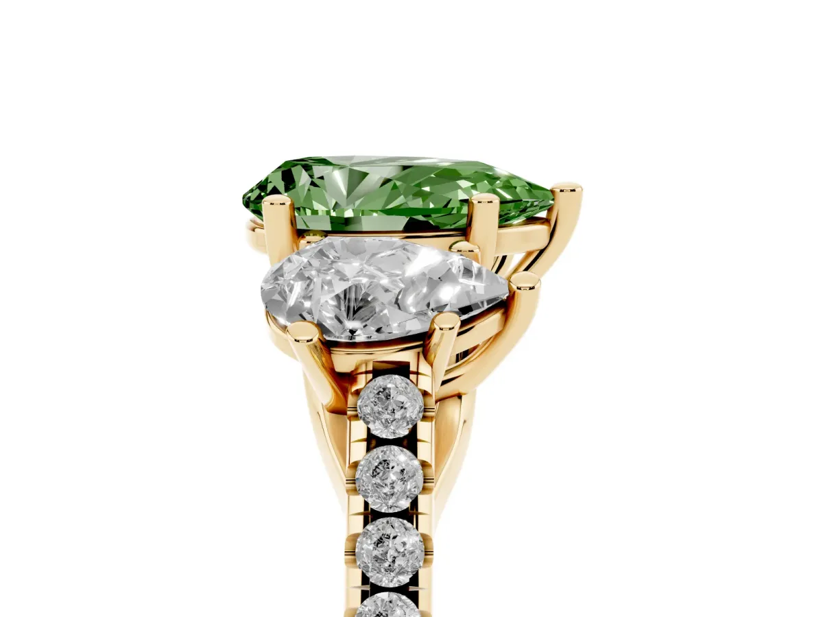 Fancy Green Three-Stone Pear Cut Diamond Ring with Round Pavé Band and Prong Setting Yellow gold