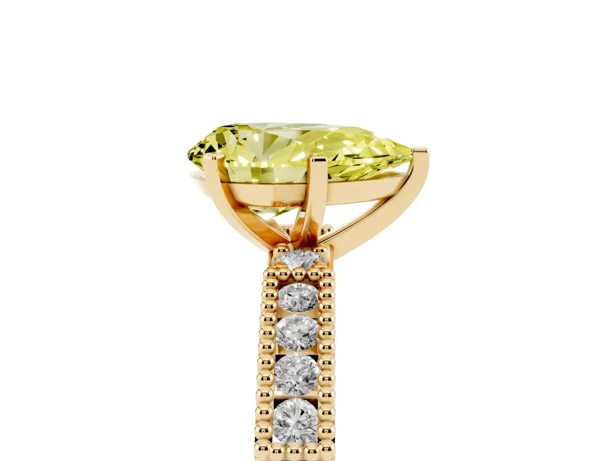 Fancy Yellow Pear Cut Solitaire with Pavé Band and Four-Prong Setting Yellow gold