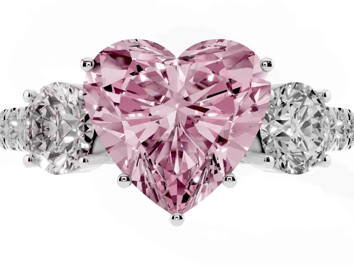 Fancy Pink Heart Cut Cut Diamond Three-Stone Ring with Round Side Stones and Pavé Band Silver