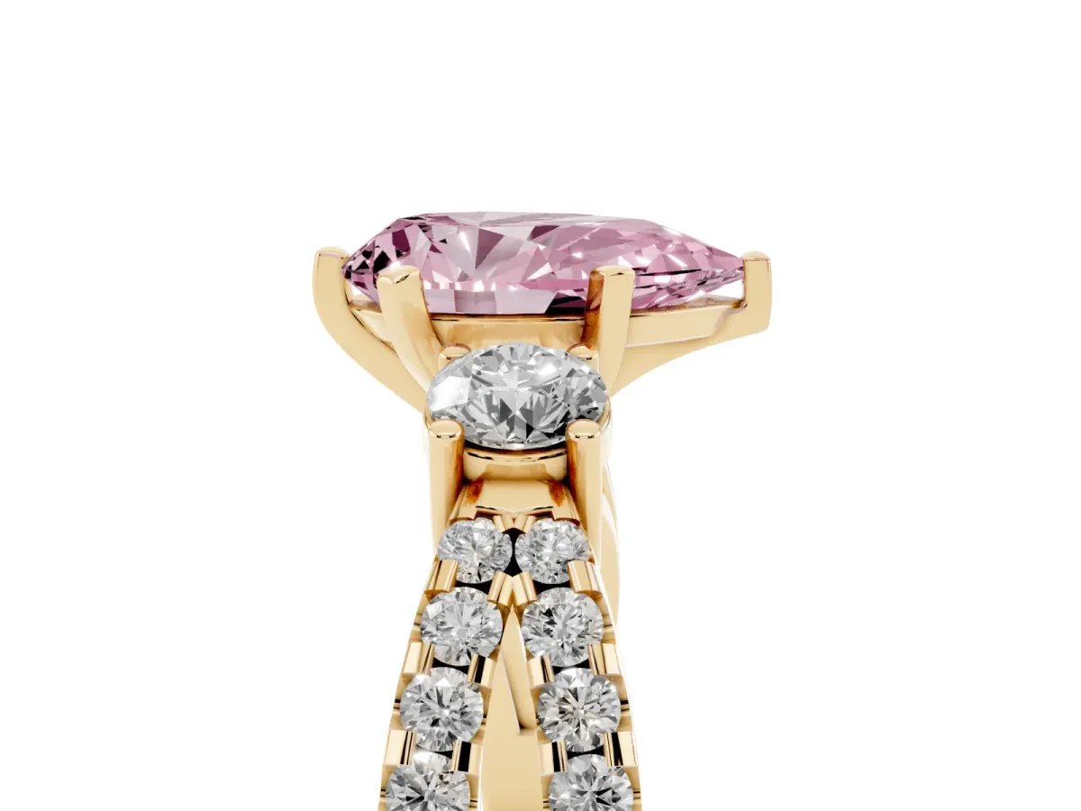 Fancy Pink Pear Cut Diamond Three-Stone Ring with Pavé Split Shank and Four-Prong Setting Yellow gold