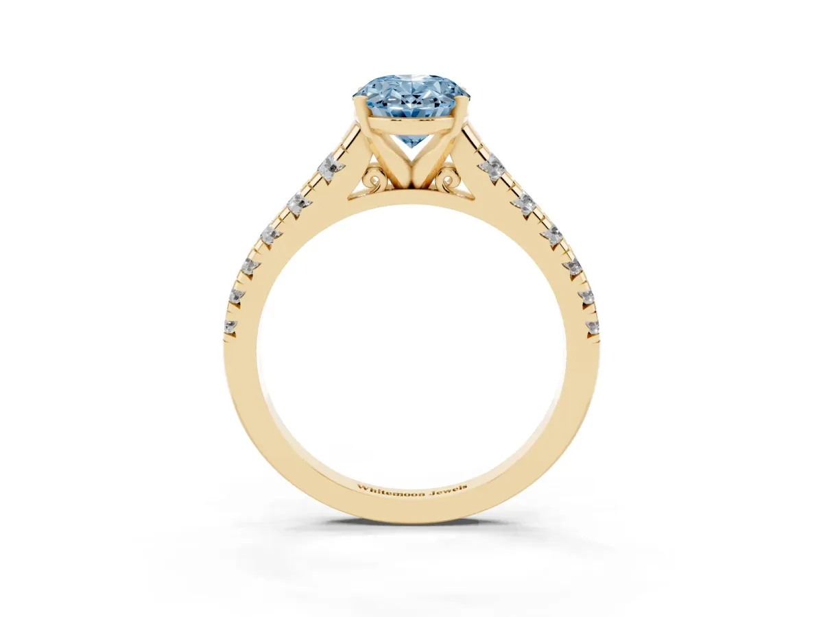 Fancy Blue Oval Cut Diamond Cathedral Solitaire Ring with Round Pavé Band Yellow gold
