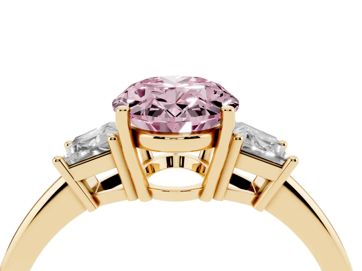 Fancy Pink Oval Cut Diamond Three-Stone Ring with Trapezoid Side Stones and Prong Setting Yellow gold