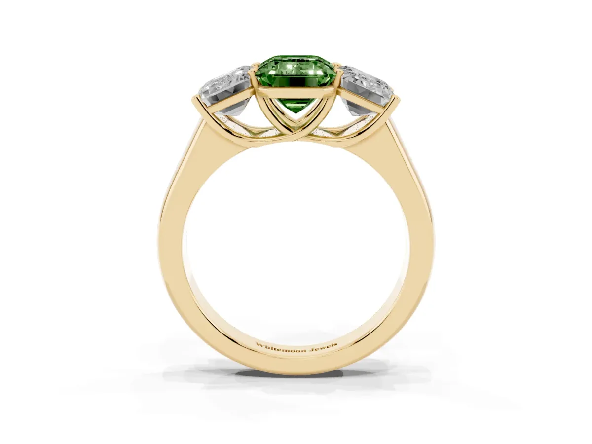 Fancy Green Emerald Cut Three-Stone Diamond Ring with Prong Setting on a Classic Band Yellow gold