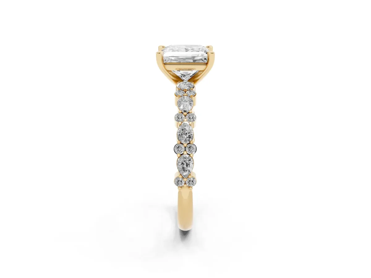 Princess Cut Diamond Side Stone Solitaire Ring with Round and Four-Prong Setting Yellow gold