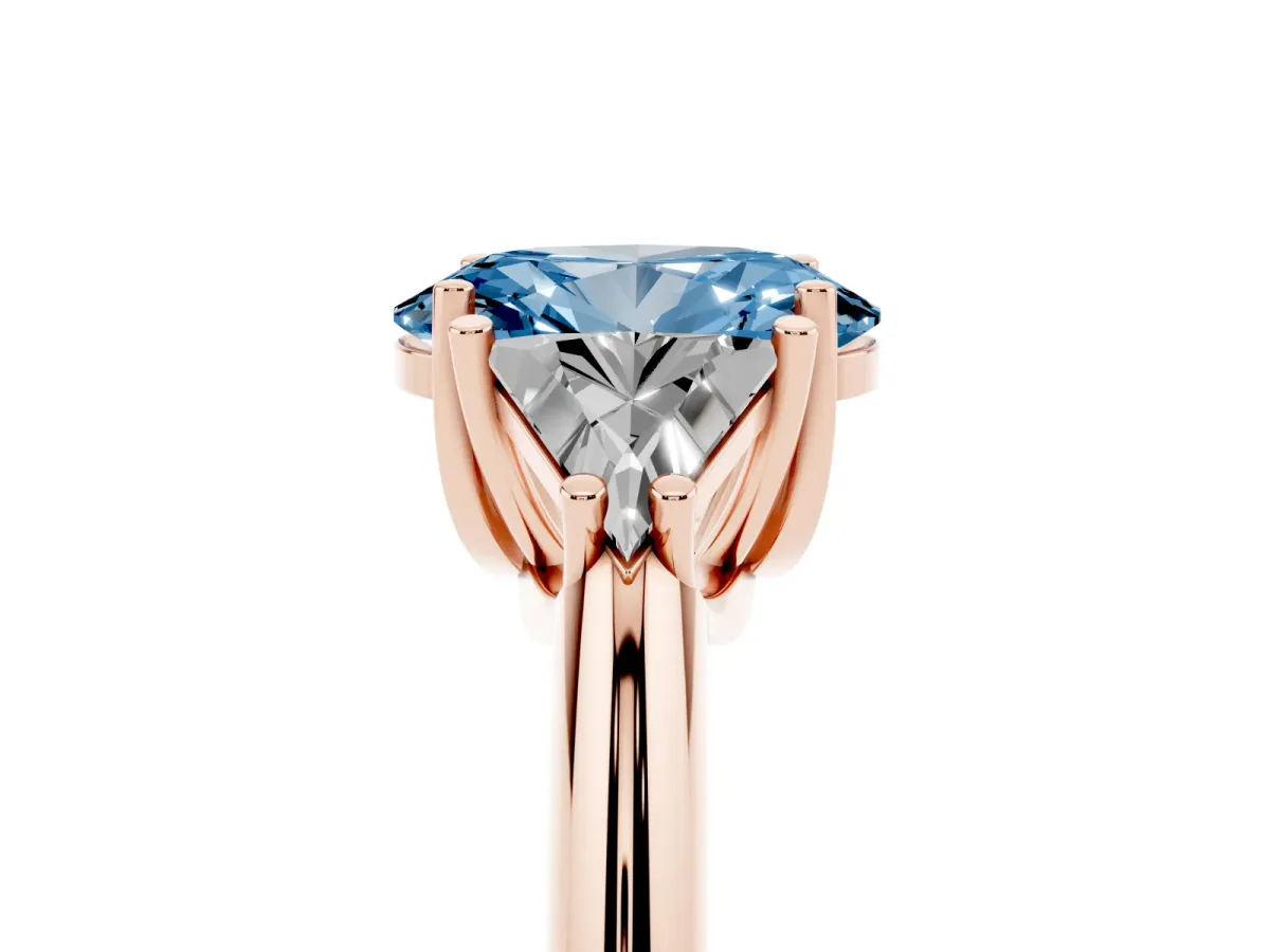 Fancy Blue Three-Stone Oval Cut Diamond Engagement Ring with Trillion Side Stones and Prong Setting Rose gold