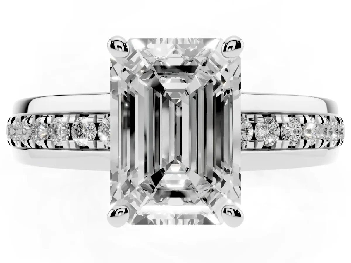 Emerald Cut Solitaire Diamond Ring with Channel Set Band and Six-Prong Setting Silver