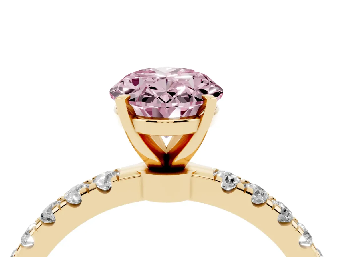 Fancy Pink Oval Cut Diamond Solitaire Ring with Pavé Accents and Four-Prong Setting Yellow gold