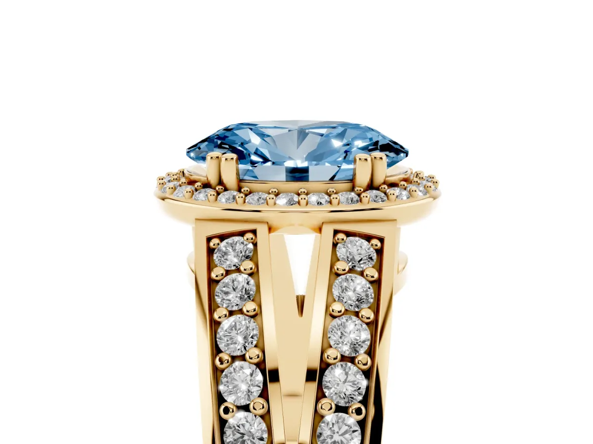 Fancy Blue Oval Cut Diamond Halo Ring with Split Shank Pavé Band and Four-Prong Setting Yellow gold