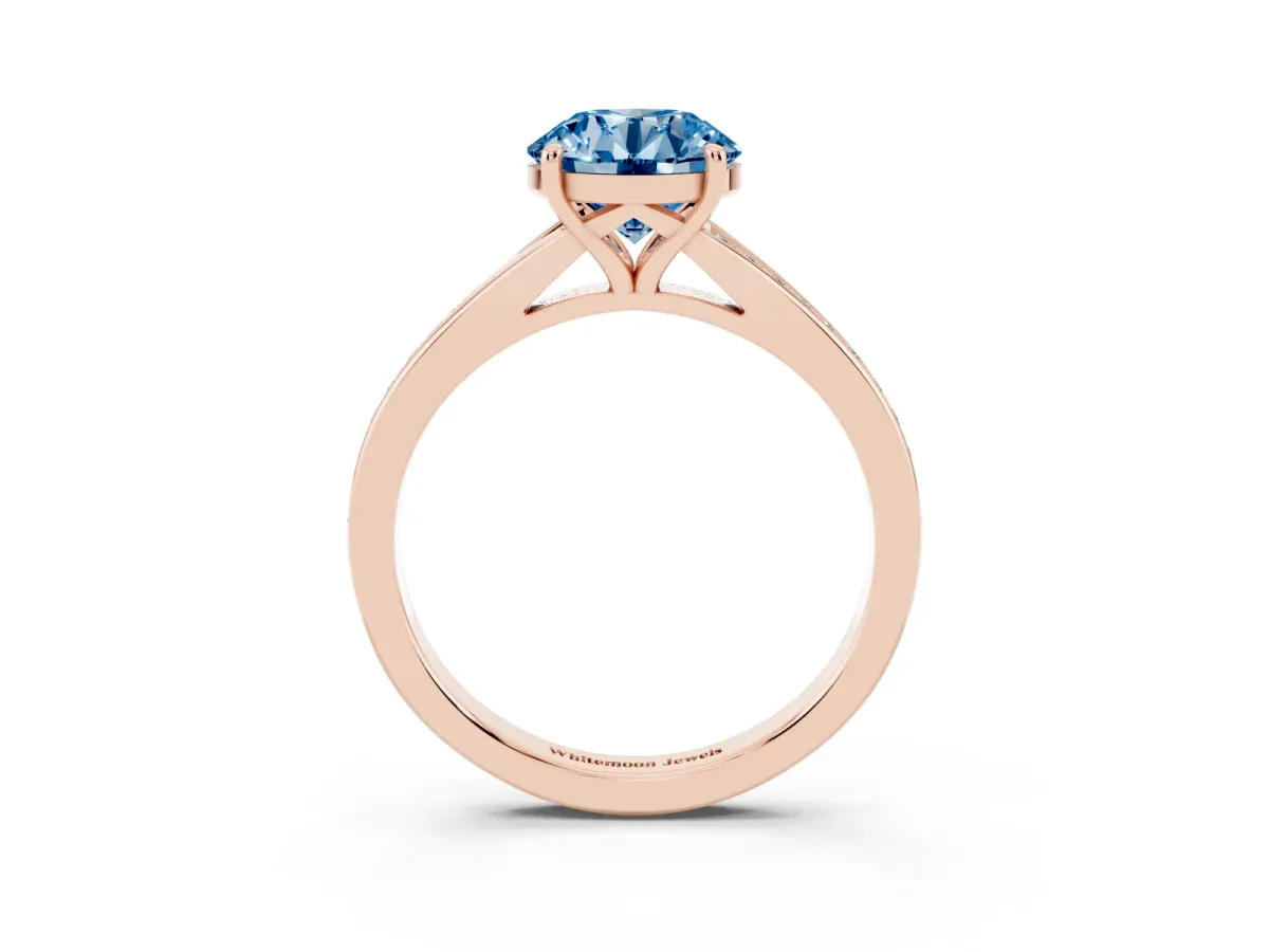 Fancy Blue Round Cut Diamond Solitaire Ring with Pavé Band and Prong Setting Rose gold