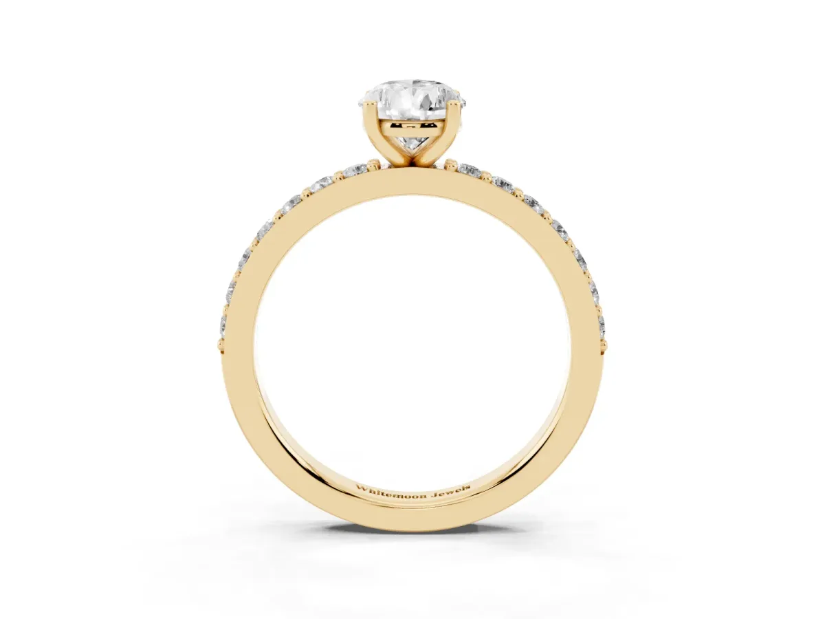 Pear Cut Cut Diamond Solitaire with Pave Band and Four-Prong Setting Yellow gold