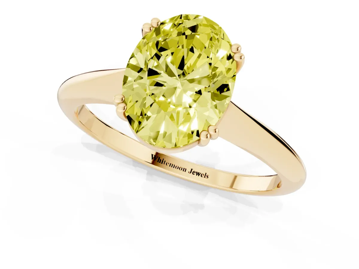 Fancy Yellow Oval Cut Solitaire Diamond Ring with Six-Prong Setting and Classic Band Yellow gold