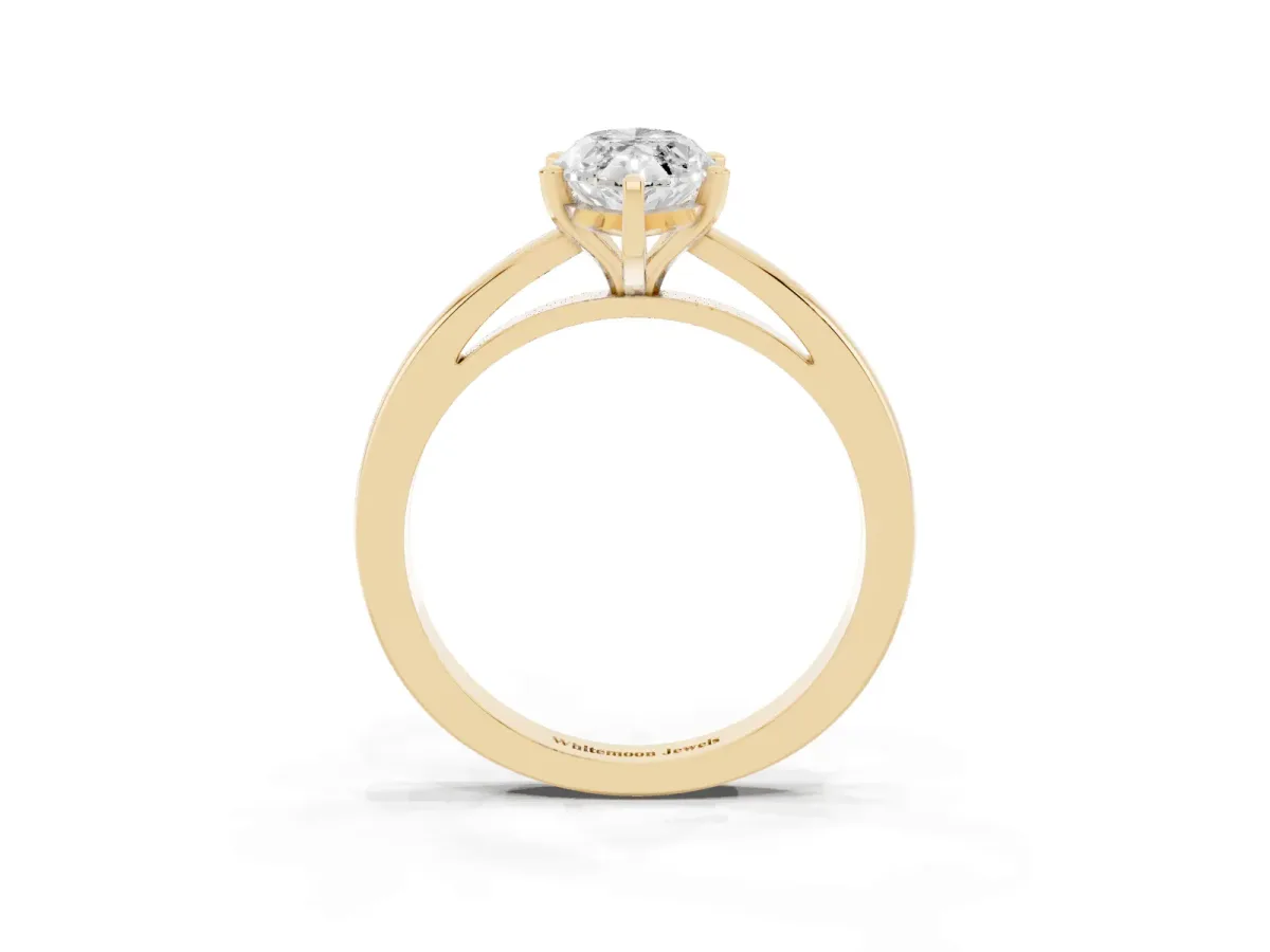 Marquise Cut Solitaire Diamond Engagement Ring with Four-Prong Setting on a Classic Band Yellow gold
