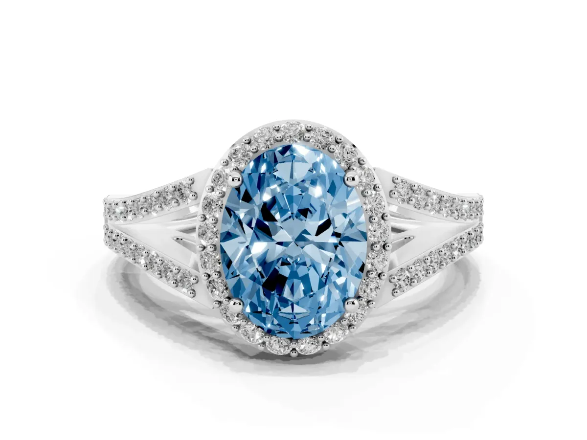 Fancy Blue Oval Cut Halo Split Shank Pave Diamond Ring with Four-Prong Setting Silver