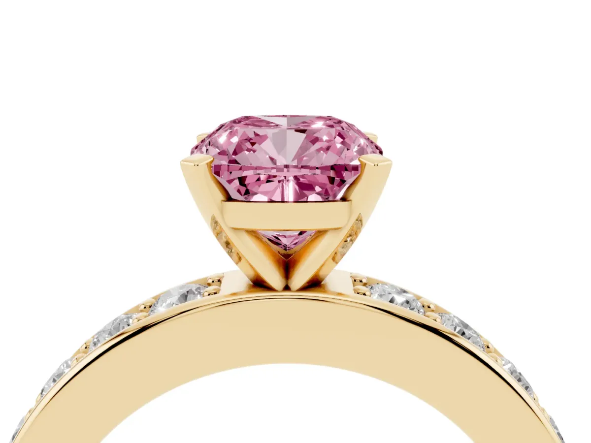 Fancy Pink Cushion Cut Diamond Engagement Ring with Channel Set Round Band and Prong Setting Yellow gold