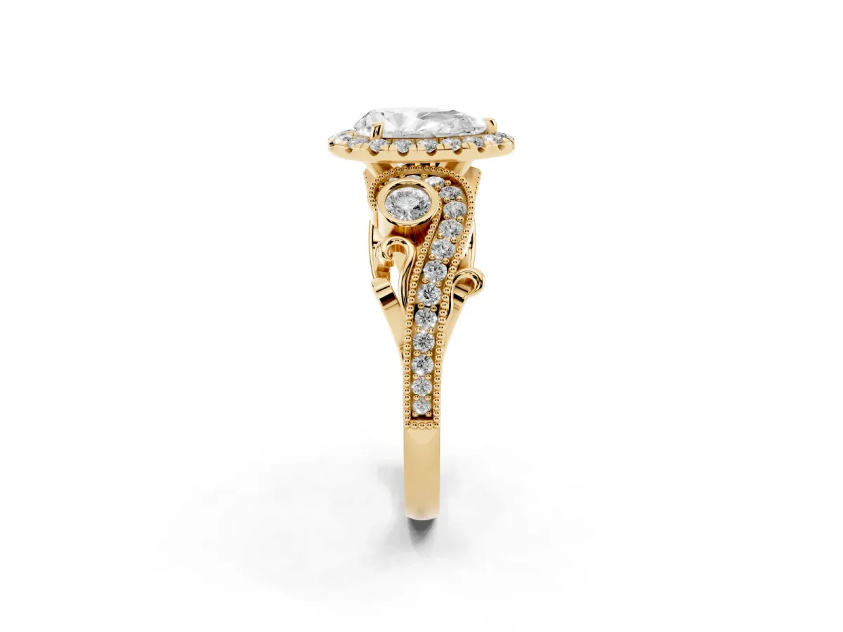 Pear Cut Halo Diamond Ring with Milgrain and Bezel Accents on a Split Shank Band Yellow gold