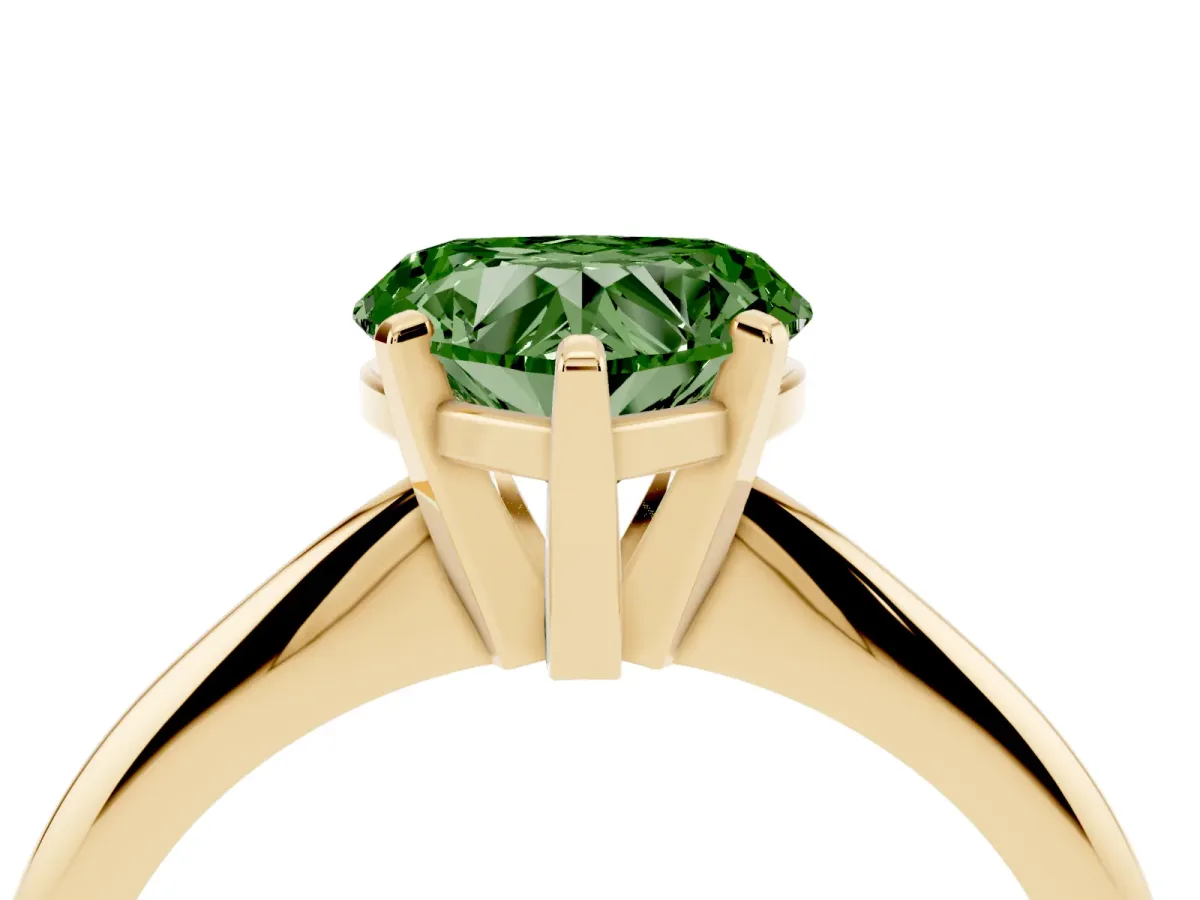 Fancy Green Heart Cut Cut Solitaire Ring with Four-Prong Setting on a Classic Band Yellow gold
