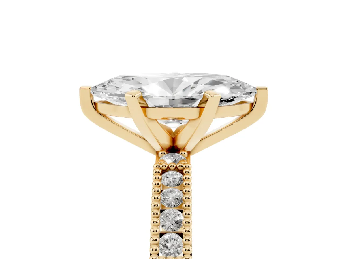 Marquise Cut Solitaire with Pavé Band and Four-Prong Setting Yellow gold