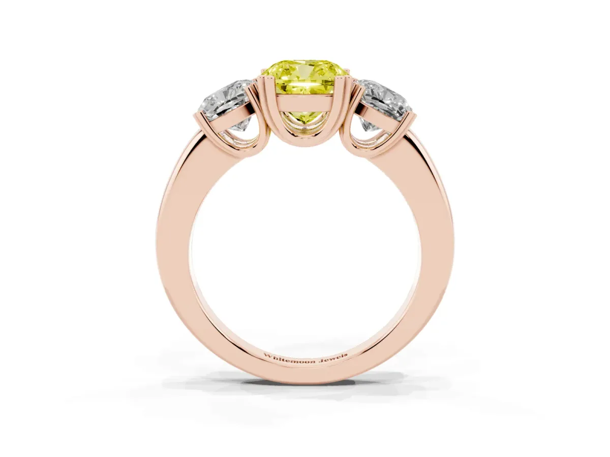 Fancy Yellow Three-Stone Cushion Cut Cut Diamond Ring with Channel Set Band and Four-Prong Setting Rose gold