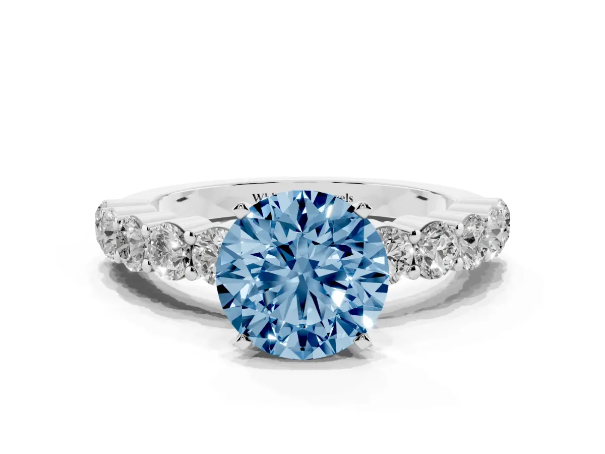 Fancy Blue Round Cut Diamond Solitaire Ring with Shared Prong Round Side Stones Silver