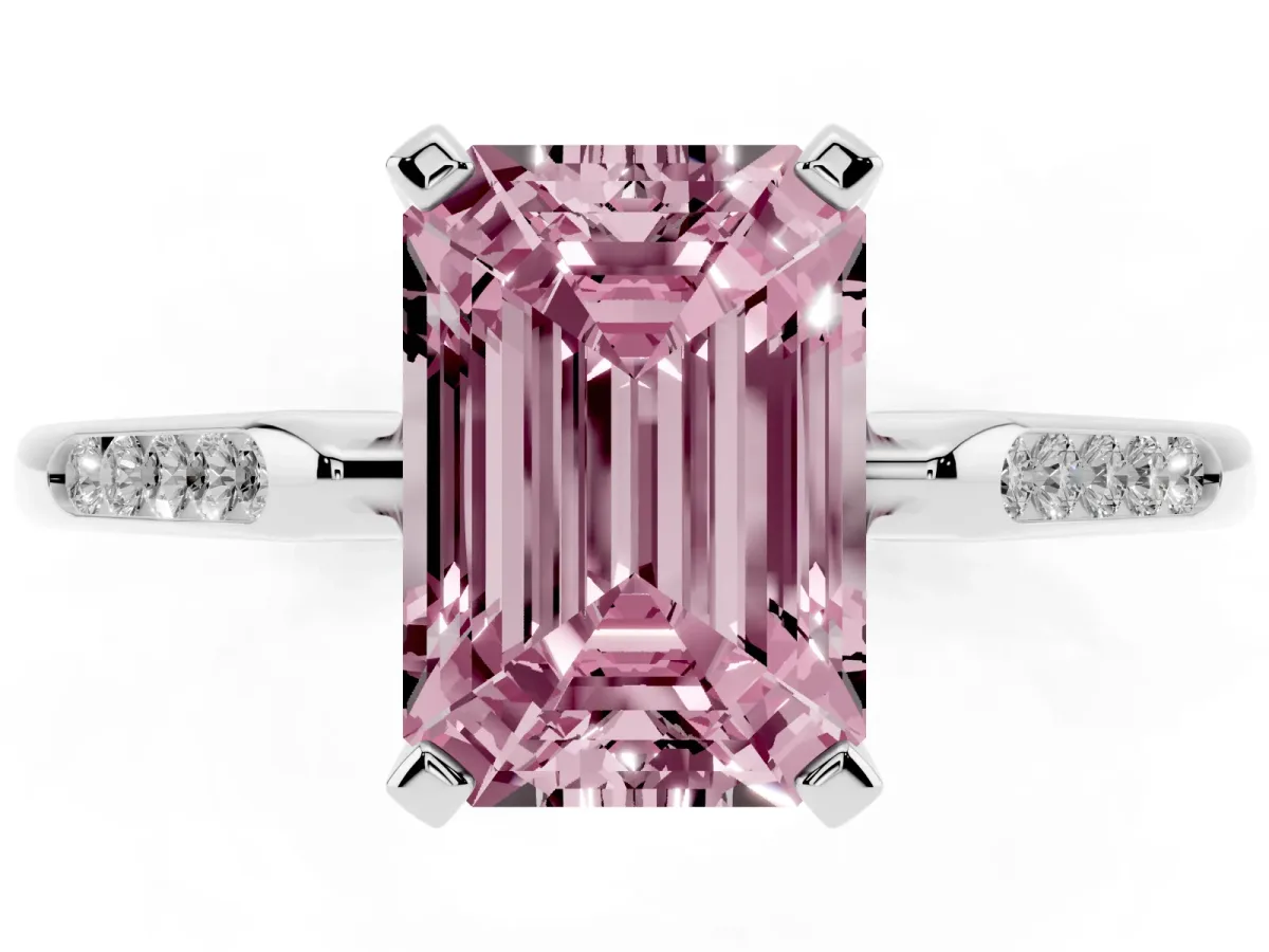 Fancy Pink Emerald Cut Diamond Solitaire Ring with Channel Set Round Band and Prong Setting White gold