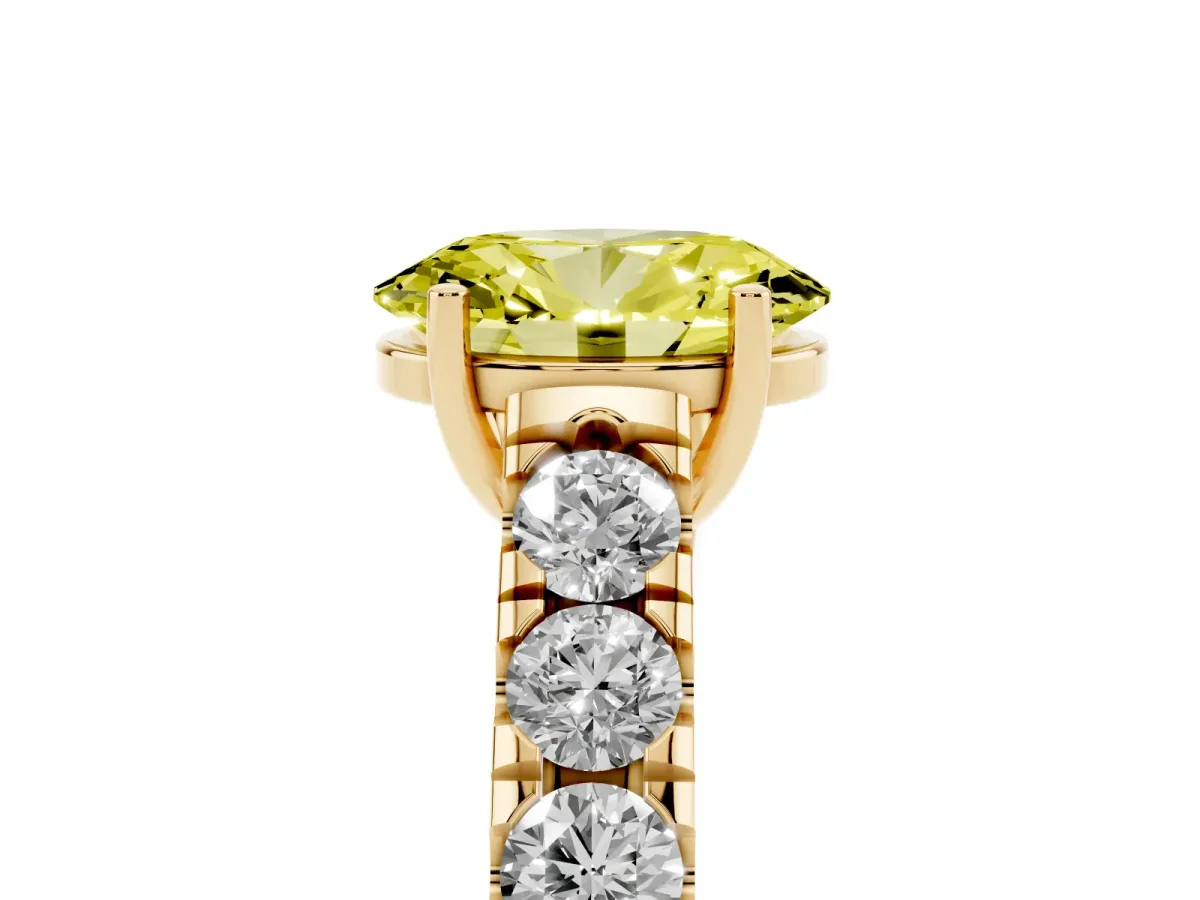 Fancy Yellow Oval Cut Cut Diamond Solitaire Ring with Micro Pave Band and Prong Setting Yellow gold