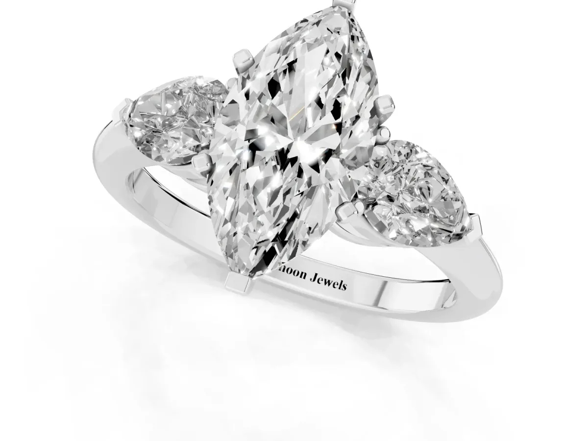 Three-Stone Marquise Cut Diamond Ring with Pear Side Stones and Four-Prong Setting Silver