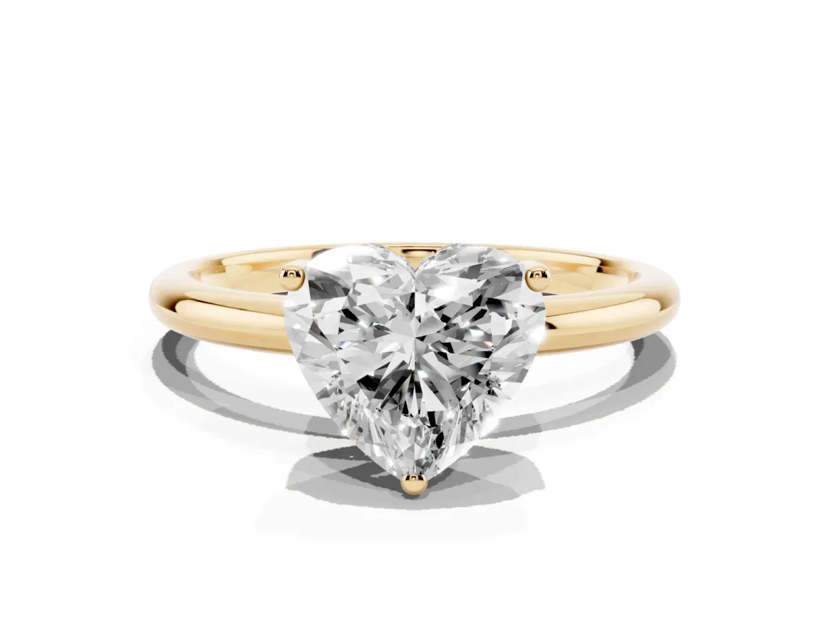 Heart Cut Cut Solitaire Engagement Ring with Four-Prong Setting and Classic Band Yellow gold