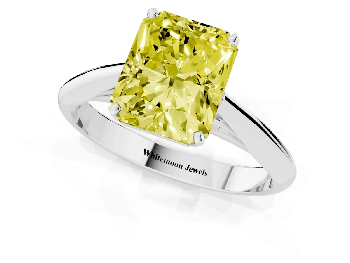 Fancy Yellow Radiant Cut Diamond Solitaire Engagement Ring with Cathedral Setting and Four-Prong Mount Silver
