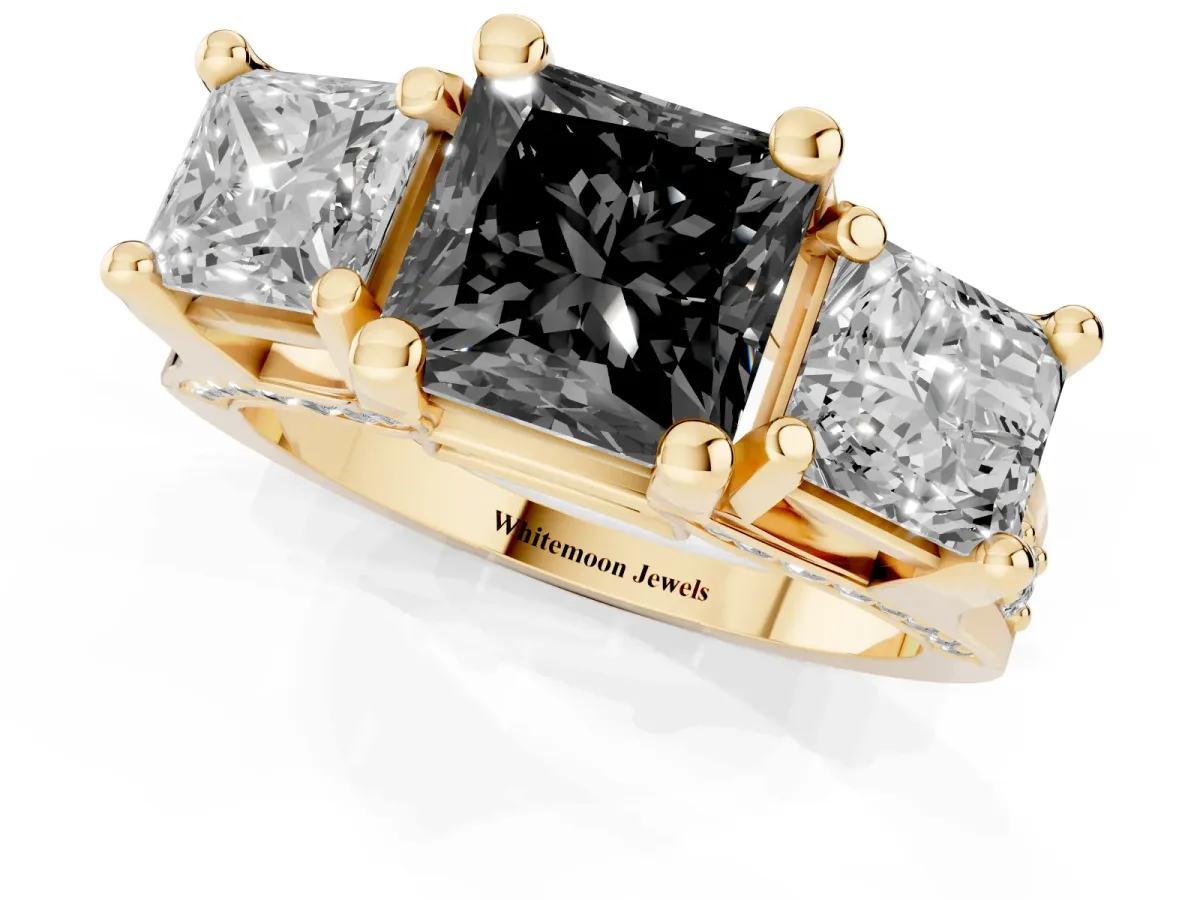 Fancy Black Princess Cut Diamond Three-Stone Ring with Channel Set Band and Four-Prong Setting Yellow gold