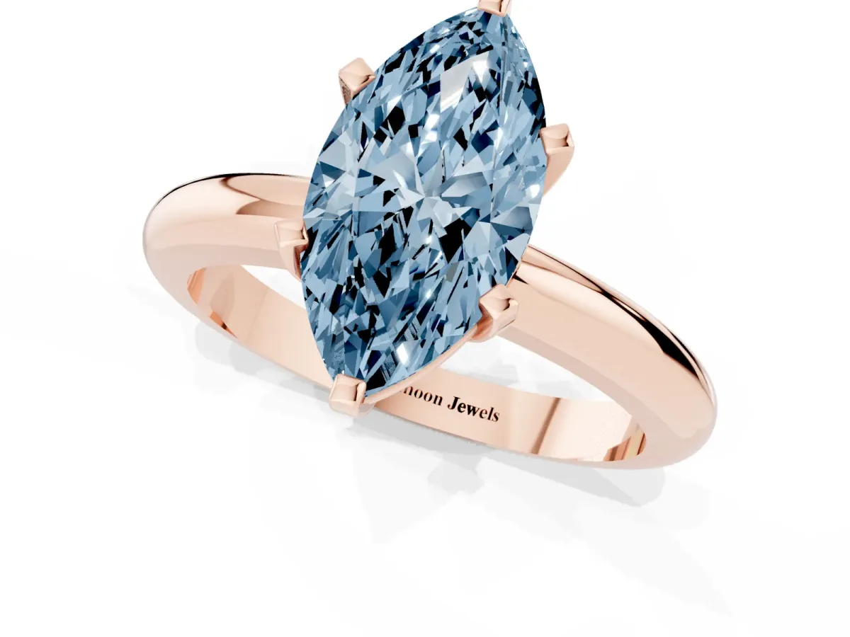Fancy Blue Marquise Cut Diamond Solitaire Engagement Ring with Round Band and Four-Prong Setting Rose gold