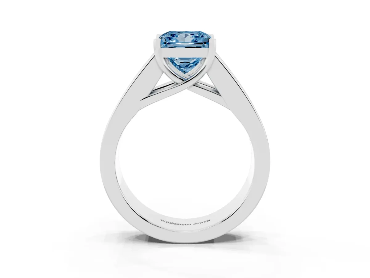 Fancy Blue Princess Cut Cut Channel Set Solitaire Ring with Four-Prong Setting Silver