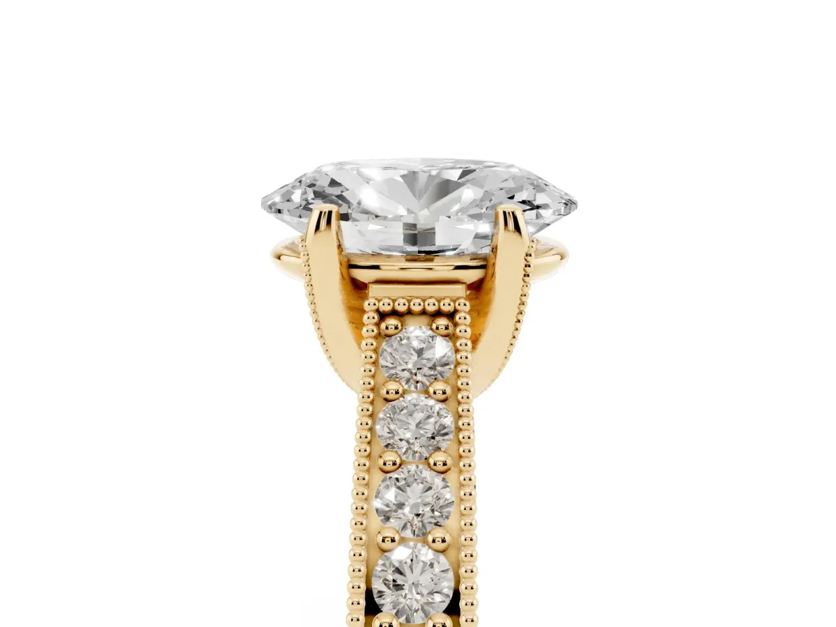 Oval Cut Cut Diamond Solitaire Ring with Milgrain Pave Band and Four Prong Setting Yellow gold