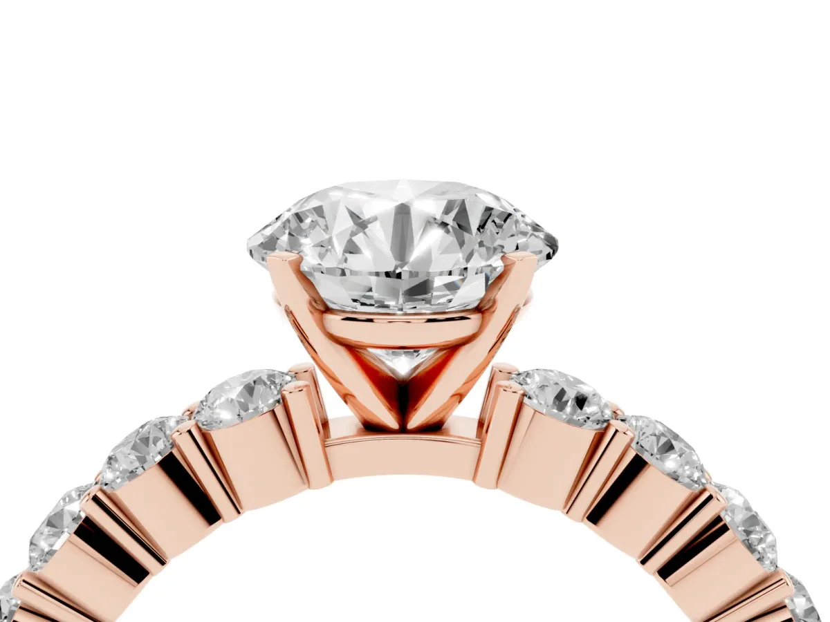 Round Cut Diamond Solitaire Ring with Shared Prong Round Side Stones Rose gold