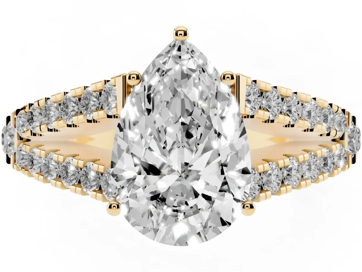 Pear Cut Diamond Split Shank Pavé Engagement Ring with Four-Prong Setting Yellow gold