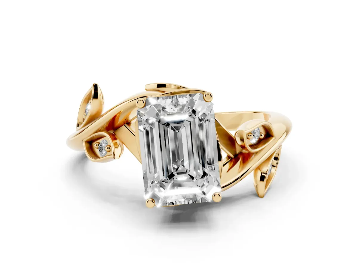 Emerald Cut Solitaire Twist Engagement Ring with Leaf Accents and Prong Setting Yellow gold