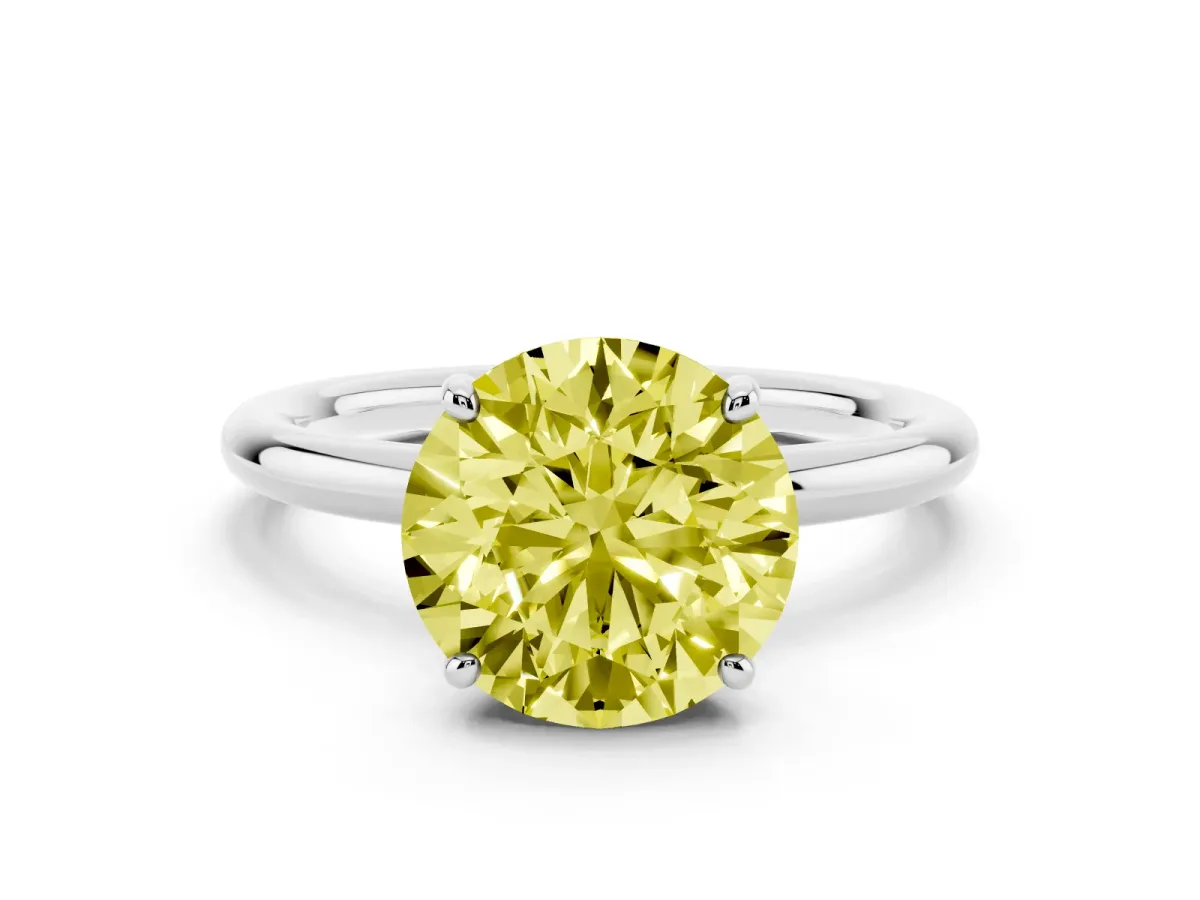 Fancy Yellow Round Cut Solitaire Diamond Ring with Four-Prong Setting on a Plain Band White gold
