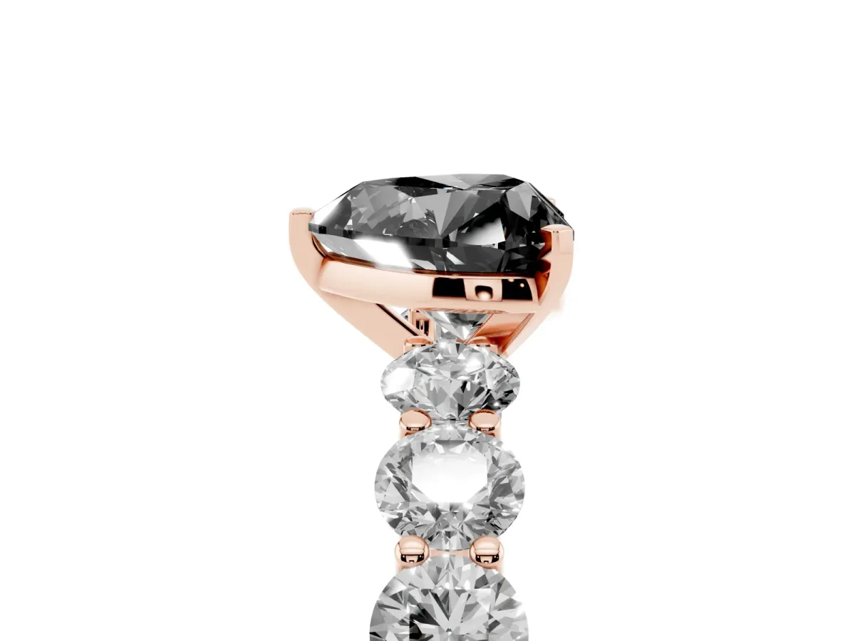 Fancy Black Heart Cut Diamond Prong Setting with Side Stones on a Pave Band Rose gold