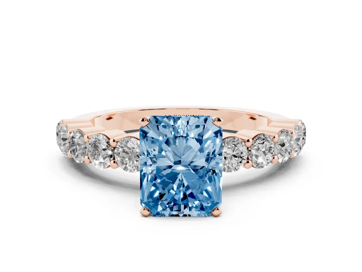 Fancy Blue Radiant Cut Diamond Solitaire Ring with Shared Prong Round Side Stones Rose gold