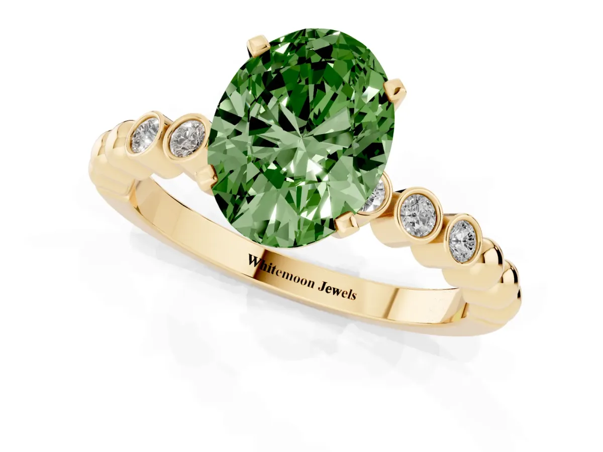 Fancy Green Oval Cut Solitaire Bezel Accent Diamond Engagement Ring with Beaded Band and Four-Prong Setting Yellow gold
