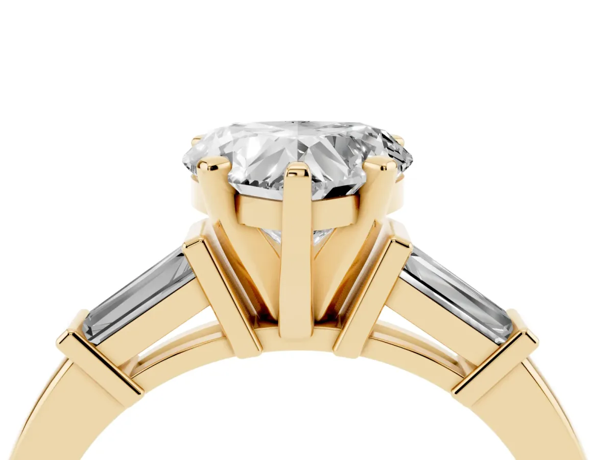 Heart Cut Cut Diamond Solitaire Ring with Tapered Baguette Accents and Four-Prong Setting Yellow gold