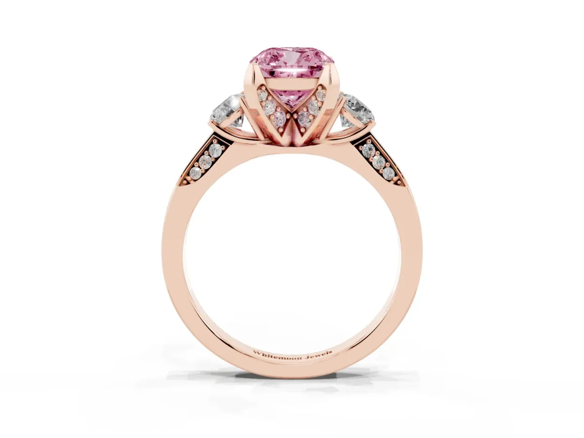 Fancy Pink Cushion Cut Brilliant Three-Stone Diamond Ring with Pavé Band and Four-Prong Setting Rose gold