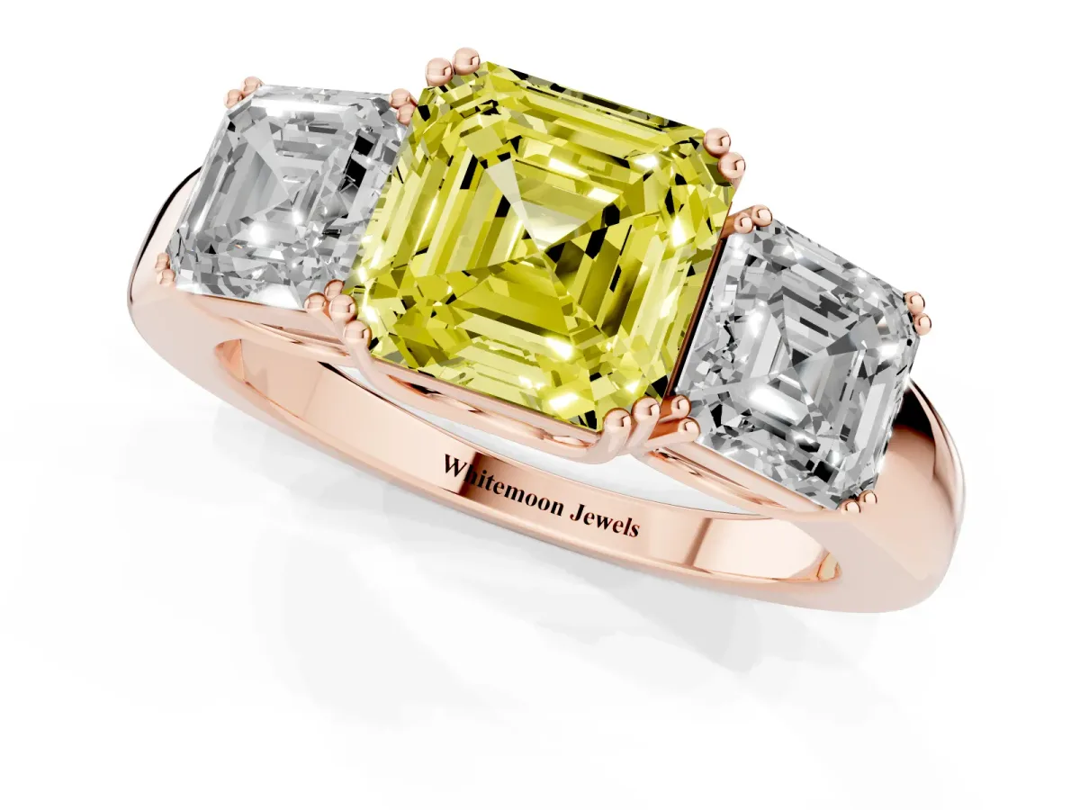 Fancy Yellow Three-Stone Asscher Cut Cut Diamond Ring with Channel Set Band and Four-Prong Setting Rose gold
