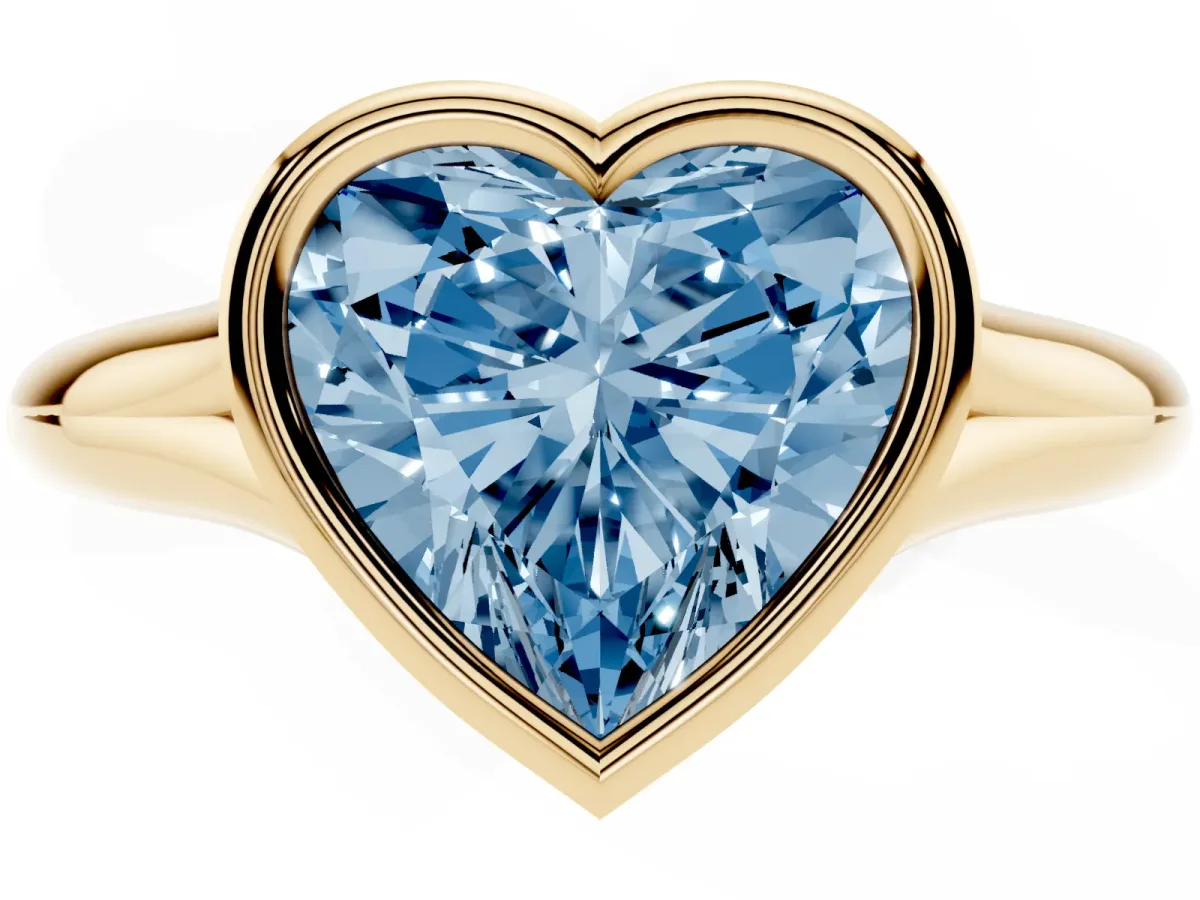 Fancy Blue Bezel Set Heart Cut Solitaire Diamond Ring with Smooth Band Yellow gold