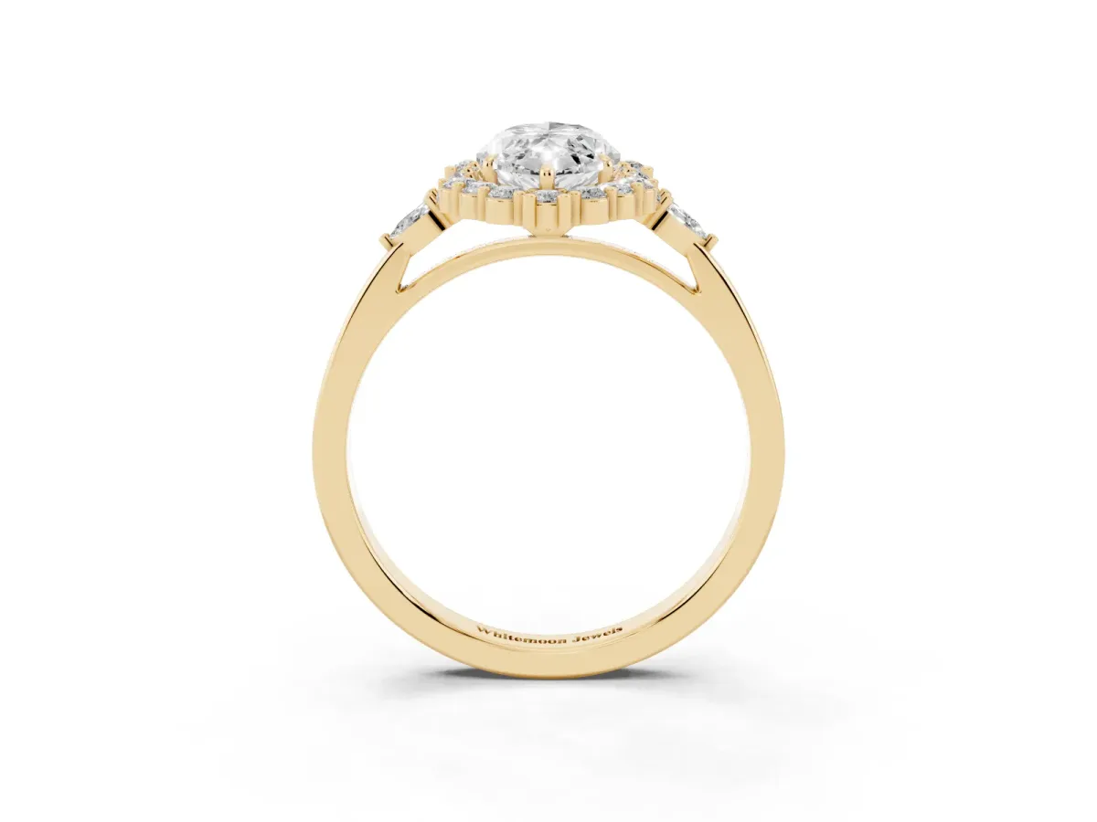 Marquise Cut Diamond Halo Ring with Pear Side Stones and Prong Setting Yellow gold