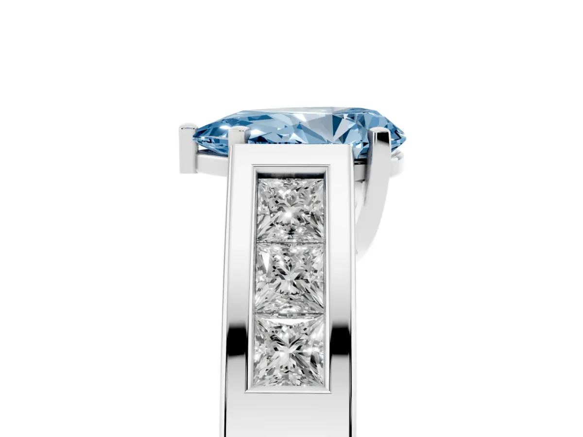 Fancy Blue Pear Cut Cut Channel Set Solitaire Ring with Four-Prong Setting Platinum