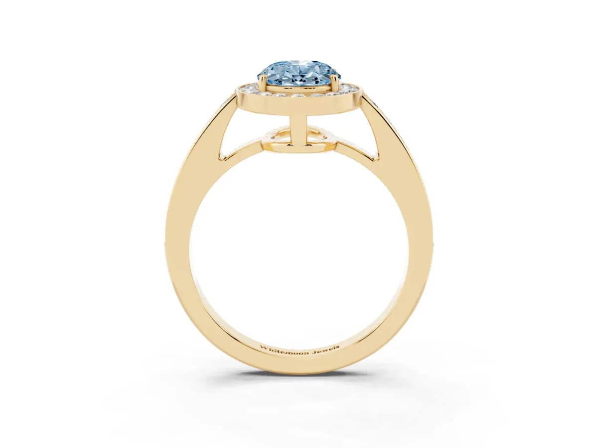 Fancy Blue Oval Cut Halo Pavé Diamond Engagement Ring with Bezel Setting Yellow gold