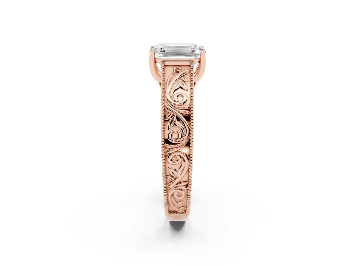 Emerald Cut Diamond Solitaire Ring with Engraved Band and Four-Prong Setting Rose gold