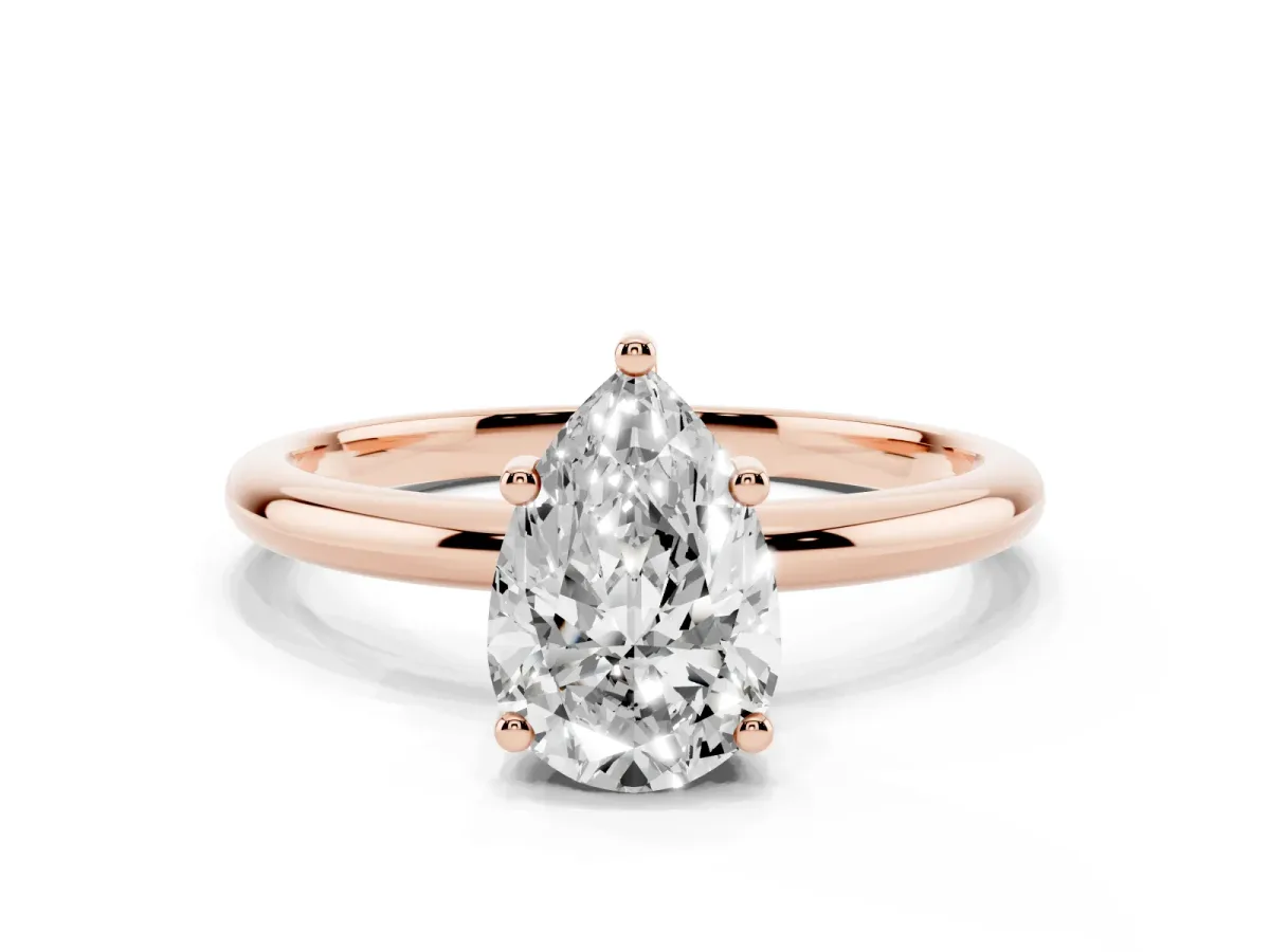 Pear Cut Cut Solitaire Engagement Ring with Four-Prong Setting and Classic Band Rose gold