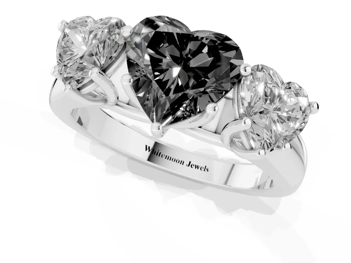 Fancy Black Heart Cut Three-Stone Diamond Ring with Prong Setting on a Classic Band Silver