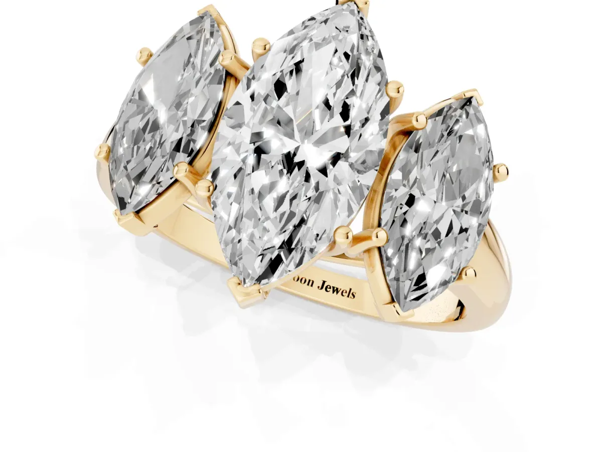 Three-Stone Marquise Cut Diamond Engagement Ring with Prong Setting Yellow gold